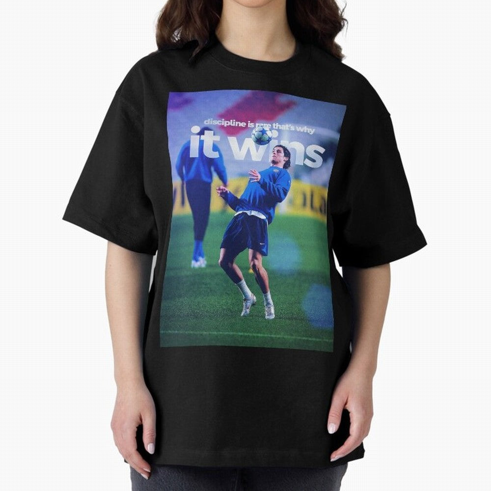 Cristiano Ronaldo - Discipline is rare that's why it wins Oversized T-Shirt Celebrate Football Heritage in Match Day Hype around FIFA World Cup 2026 Group Stage, Mbappe, Netherlands, Worldwide Fan Energy, Dramatic Goals, Stadium Lights and