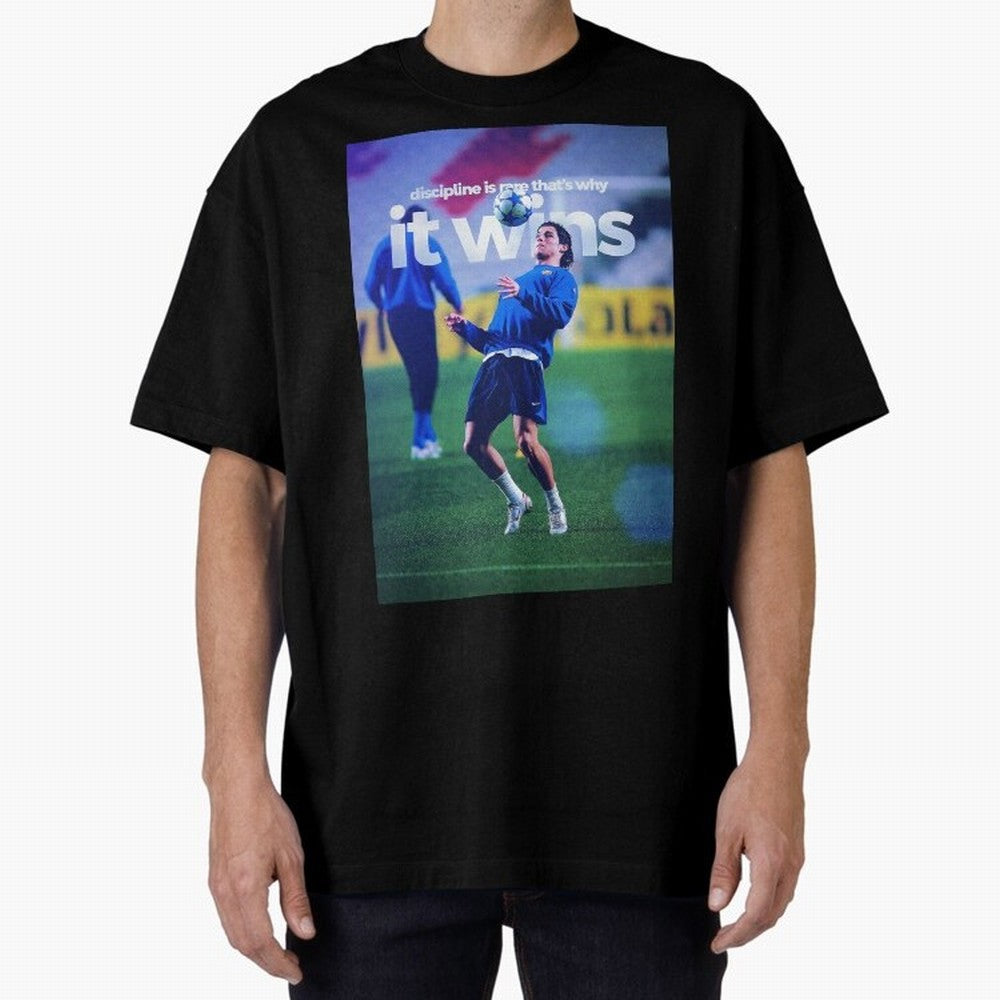 Cristiano Ronaldo - Discipline is rare that's why it wins Oversized T-Shirt Celebrate Football Heritage in Match Day Hype around FIFA World Cup 2026 Group Stage, Mbappe, Netherlands, Worldwide Fan Energy, Dramatic Goals, Stadium Lights and