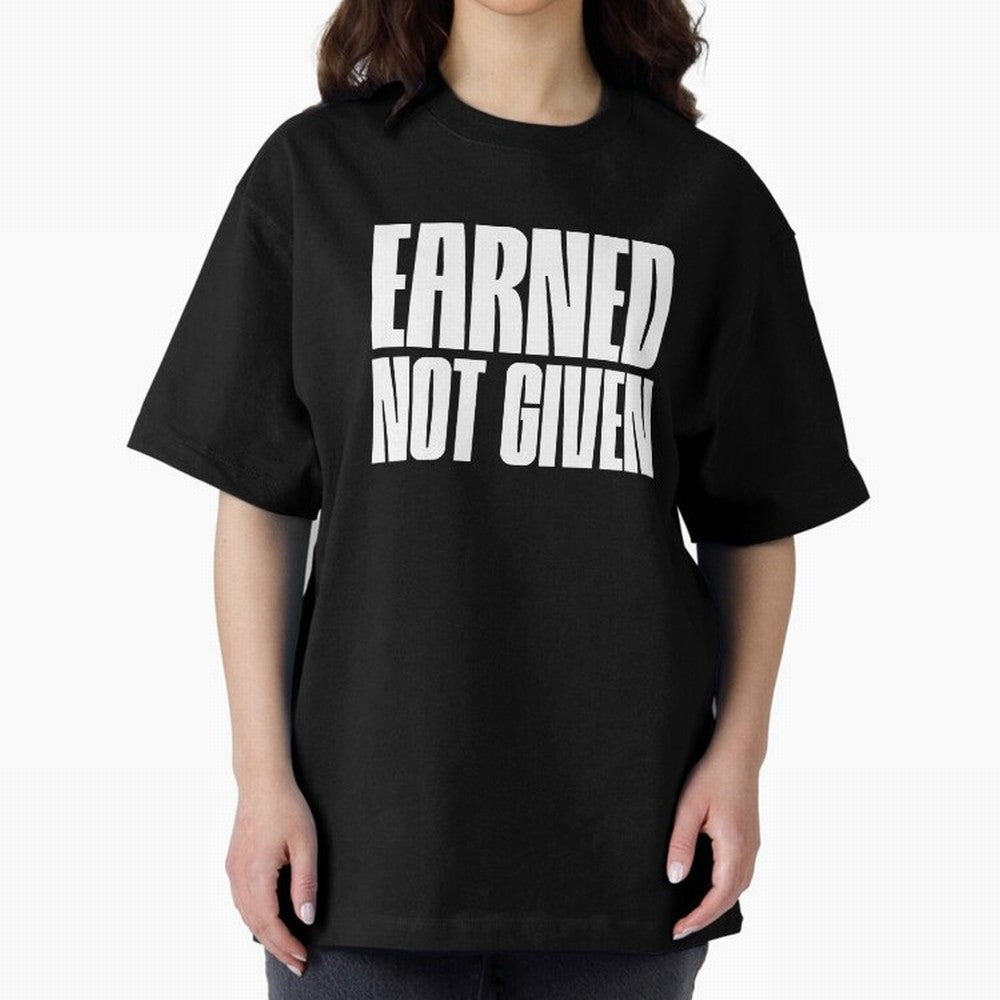 Earned not given white Oversized T-Shirt Bring Stadium Energy to the FIFA World Cup 2026 Journey through Mbappe and Neymar Highlights, Netherlands Pride, Sports Nostalgia, International Competition, Famous Players and Unforgettable Victories; Great