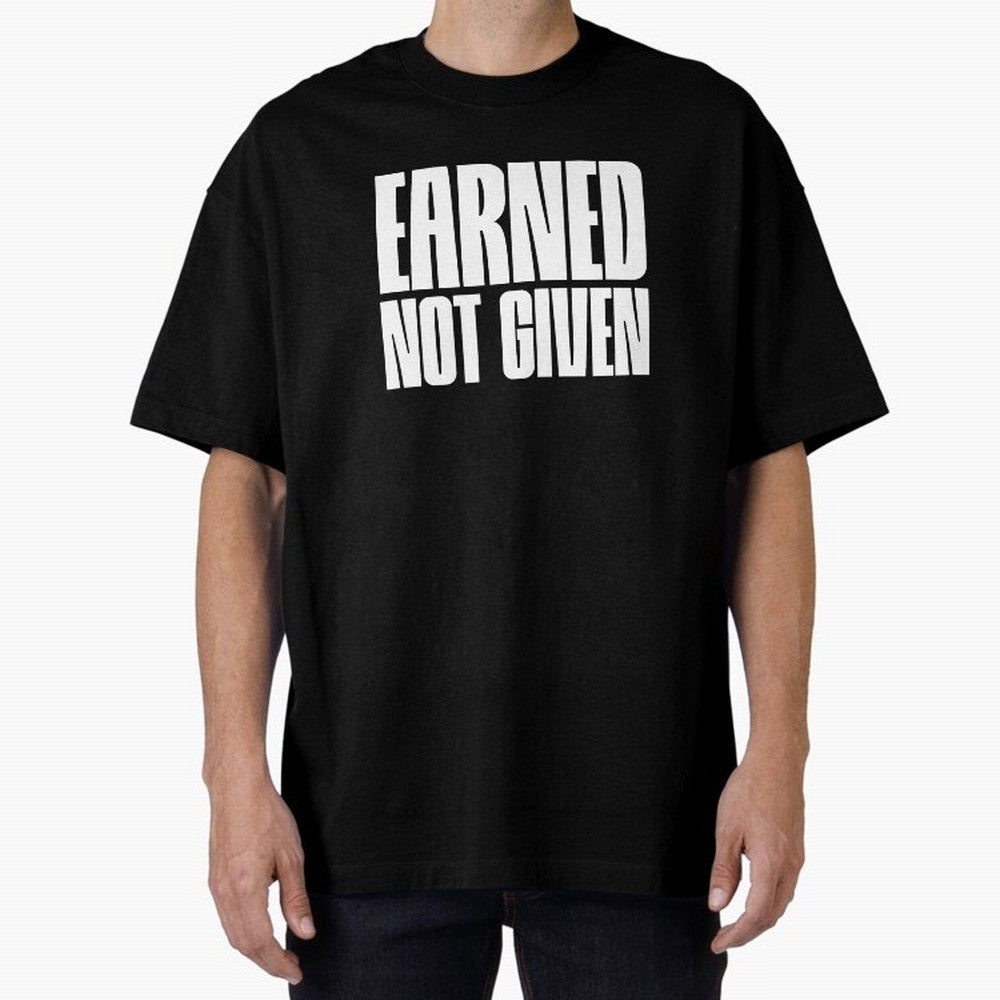Earned not given white Oversized T-Shirt Bring Stadium Energy to the FIFA World Cup 2026 Journey through Mbappe and Neymar Highlights, Netherlands Pride, Sports Nostalgia, International Competition, Famous Players and Unforgettable Victories; Great