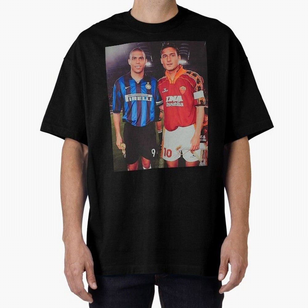 Clash of Class. Francesco Totti and Ronaldo Nazario sometime in the 90s. Oversized T-Shirt Build FIFA World Cup 2026 Driven by CR7, Argentina and Brazil Energy, Stadium Memories, Football Loyalty, International Chants and Championship Tradition;
